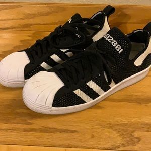 Adidas knit Superstars.